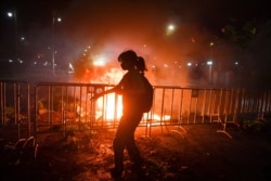 A demonstrator takes part in an anti-government protest, in Bangkok, Thailand, March 20, 2021.