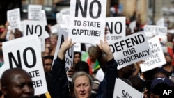 Demonstrators protest against South African President Jacob Zuma in Pretoria, South Africa, April 7, 2017. 