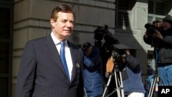 FILE - Paul Manafort, President Donald Trump's former campaign chairman, leaves the federal courthouse after his hearing in Washington, Feb. 28, 2018.