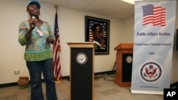 FILE - Abosede Oladayo, an AIDS activist living with HIV, speaks during an event to mark World Aids Day at the U.S. Embassy in Lagos, Nigeria, Dec. 2, 2011. Groups fighting AIDS warned Jan. 14, 2014, that a new Nigerian law criminalizing same-sex marriage, gay organizations will harm anti-AIDS efforts.