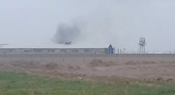 FILE - Smoke appears to rise from Qarchak women's prison near Tehran, in this photo first published online by Iranian Dervish news outlet Majzooban Noor on Feb. 8, 2019.