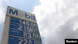 The prices of petrol, diesel, kerosene and LPG are displayed in Naira outside a gas station in Lagos, Nigeria, Sept. 9, 2019.