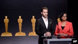 Chris Pine, left, and Academy President Cheryl Boone Isaacs announce the Academy Awards nominations at the 87th Academy Awards nomination ceremony on Jan. 15, 2015 in Beverly Hills, Calif. 