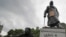 FILE - Protesters gather around the Winston Churchill statue in Parliament Square during a Black Lives Matter rally in London June 7, 2020.