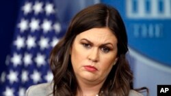White House press secretary Sarah Huckabee Sanders listens to a reporter's question during the daily press briefing at the White House, Dec. 7, 2017, in Washington. Sanders told reporters: “I believe there are actions that are taking place for a (Yemen) port to open ..."