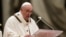 Pope Francis celebrates Christmas Eve Mass, at St. Peter's Basilica, at the Vatican, Dec. 24, 2021.