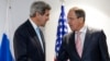 US Secretary of State John Kerry, left, and Russian Foreign Minister Sergei Lavrov talk an Organization for Security and Cooperation in Europe (OSCE) meeting in Basel, Switzerland, Dec. 4, 2014.