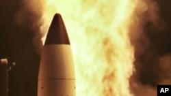 In this Thursday, April 14, 2011 photo released by the Missile Defense Agency, a Standard Missile-3 (SM-3) is launched from the USS O’Kane in a joint Missile Defense Agency and U.S. Navy test conducted at Hickam Air Force Base, Hawaii.