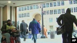 Veeda Simpson (on scooter) has been selling Street Sense for four years. Before becoming a vendor, she was homeless.