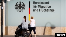 FILE - An office of the Federal Office for Migration and Refugees is pictured in Berlin, Germany.