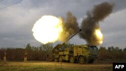 Gunners from 43rd Separate Mechanized Brigade of the Armed Forces of Ukraine fire at Russian position with a 155 mm self-propelled howitzer 2C22 "Bohdana", in the Kharkiv region, on April 21, 2024, amid the Russian invasion in Ukraine. (Photo by Anatolii 