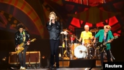 British veteran rockers The Rolling Stones' singer Mick Jagger sings during a concert on their "Latin America Ole Tour" at Morumbi stadium in Sao Paulo, Brazil, Feb. 27, 2016. 