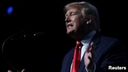 President Donald Trump delivers remarks at the Turning Point USA Student Action Summit at the Palm Beach County Convention Center in West Palm Beach, Fla., Dec. 21, 2019.