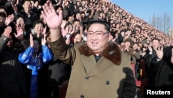 North Korean leader Kim Jong Un meets with participants in the 4th National Meeting of Activists in Agricultural Field in Pyongyang, North Korea, in this undated picture released by North Korea's Korean Central News Agency, Dec. 28, 2018.