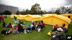 Los migrantes venezolanos llegaron al nuevo campamento de refugiados, adecuado por el gobierno en Bogotá, el 13 de noviembre.