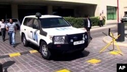 Image taken from AP Television shows a UN vehicle leaving the Four Seasons Hotel in Damascus, Syria, Aug. 27, 2013. 