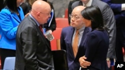 United Nations Ambassadors Vasily Nebenzya of Russia, left, Liu Jieyi of China, center, and Nikki Haley of the U.S., right, confer after the United Nations nonproliferation meeting on North Korea, Sept. 4, 2017 at U.N. headquarters.