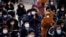Buddhist believers pray for their children’s success in the college entrance examinations amid the coronavirus disease (COVID-19) pandemic, at a Buddhist temple in Seoul, South Korea, Dec. 2, 2020. 