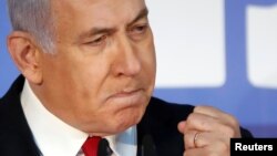 Israeli Prime Minister Benjamin Netanyahu delivers a statement to the media in his residency in Jerusalem, Feb. 28, 2019 