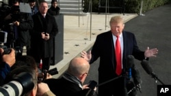 FILE - President Donald Trump speaks to reporters on the South Lawn of the White House, in Washington, Nov. 29, 2018.
