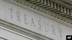 FILE - This May 4, 2021, photo shows the Treasury Building in Washington.