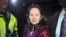 FILE - This TV image provided by CTV to AFP shows Huawei Technologies Chief Financial Officer Meng Wanzhou as she exits the court registry following the bail hearing at British Columbia Superior Courts in Vancouver, British Columbia, Dec. 11, 2018.