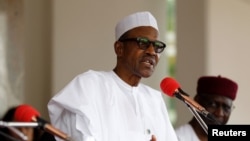 FILE - Nigerian President Muhammadu Buhari speaks at the presidential villa in Abuja, Nigeria.