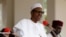 FILE - Nigerian President Muhammadu Buhari speaks at the presidential villa in Abuja, Nigeria.