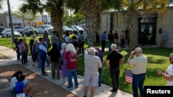 ภาพการใช้สิทธิ์ในการเลือกตั้งขั้นต้นสหรัฐฯ ในวัน 'ซูเปอร์ทิวส์เดย์' จากเมืองเเม็คแอลเลน รัฐเท็กซัส 5 มี.ค. 2024