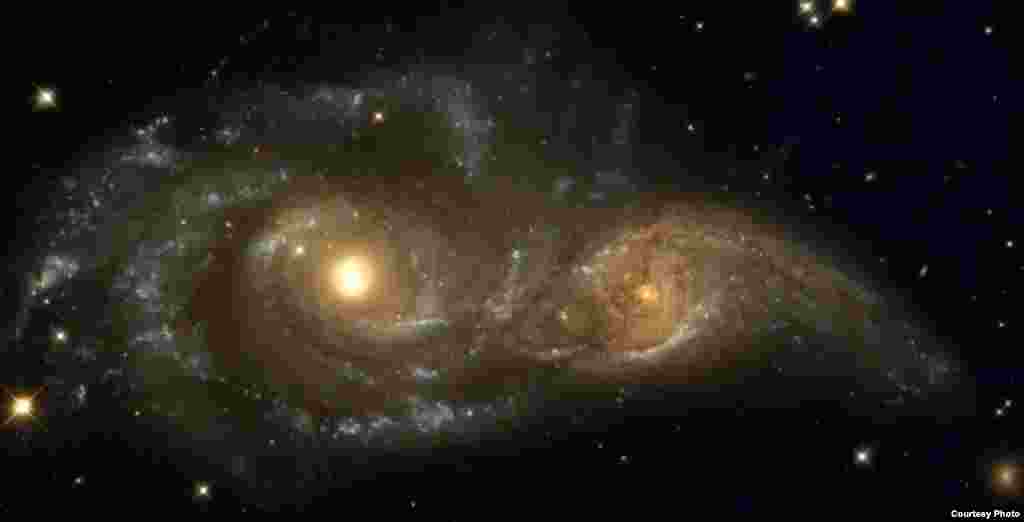 The near collision of two spiral galaxies taken by NASA's Hubble Space Telescope and its Wide Field Planetary Camera 2 on Nov. 4, 1999. (NASA)