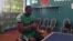 George Wyndham practices table tennis at the National Stadium in Freetown, Sierra Leone, March 12, 2016. (N. deVries/ VOA news)