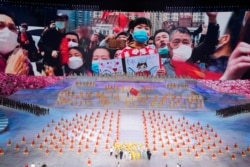 Performers take part in a gala show ahead of the 100th anniversary of the founding of the Chinese Communist Party in Beijing on June 28, 2021.