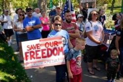 An anti-mask rally outside of the Utah Governors Mansion, Sept. 12, 2020, in Salt Lake City.