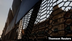 Fences are seen outside the National Palace ahead of expected violence in a Women's Day protest, in Mexico City, Mexico, March 5, 2021. 