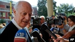 UN Special Envoy for Syria Staffan de Mistura talks with journalists as he arrives at a conference on the situation in Syria and Iraq held by Catholic charities operating in those regions, at the Vatican, Sept. 29, 2016. 