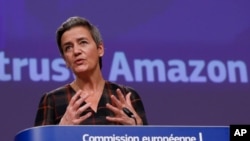 European Executive Vice-President Margrethe Vestager speaks during a press conference regarding an antitrust case with Amazon at EU headquarters in Brussels, Nov. 10, 2020.