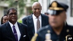 FILE - Bill Cosby arrives for his sexual assault trial at the Montgomery County Courthouse in Norristown, Pa., June 5, 2017. 