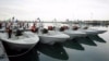 Screengrab from video showing Iranian speed boats during a March 2016 ceremony.
