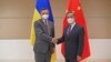 Міністр закордонних справ України Дмитро Кулеба під час зустрічі із главою МЗС Китаю Ванг Ї у вересні 2022 року. Фото: Li Rui/Xinhua via AP 