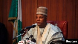 FILE - Borno state Governor Kashim Shettima on Saturday commended security and vigilante forces, saying that the death toll in a Boko Haram raid on the village of Zabarmari would have been much higher had it not been for their "gallantry."