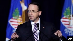 FILE - Deputy Attorney General Rod J. Rosenstein gives opening remarks at the Project Safe Neighborhoods National Conference in Kansas City, Missouri, Dec. 5, 2018. 