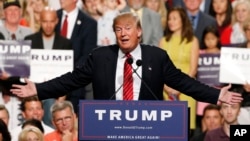 FILE - Then-Republican presidential candidate Donald Trump speaks before a crowd of 3,500, July 11, 2015, in Phoenix. Trump was just a few weeks into his candidacy in 2015 when came to Phoenix for a speech that ended up being a bigger moment in his campaign than most people realized at the time. 
