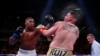 Anthony Joshua, à gauche, face à Andy Ruiz, lors d'un combat, à New York, USA, le 1er juin 2019.