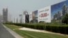 In this Wednesday, June 6, 2018 photo, billboards advertise luxury villas and apartments in Dubai, United Arab Emirates. A new report released Tuesday, June 12, 2018, by the Washington-based Center for Advanced Defense Studies, relying on leaked property data from the city-state, described Dubai’s real-estate market as a haven for money launderers, terror financiers and drug traffickers sanctioned by the U.S. in recent years. Officials in Dubai said they could not comment on the report. (AP Photo/Kamran Jebreili) 