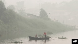 A worker adjusts lanterns for upcoming celebration of Buddha&#39;s birthday at Jogye temple in Seoul, South Korea.