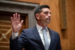 FILE - Acting Secretary of Homeland Security Chad Wolf is sworn in before the Senate Homeland Security and Governmental Affairs Committee during his confirmation hearing on Capitol Hill in Washington, Sept. 23, 2020.