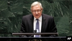 FILE - Sergei Ryabkov, deputy foreign minister of the Russian Federation, addresses the Nuclear Nonproliferation Treaty conference at United Nations headquarters, May 4, 2010. Ryabkov said Moscow would retaliate if the U.S. expands sanctions against it. 