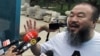 China Urges Freed Artist to Abide By Bail Release Terms