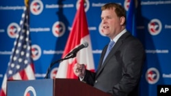 Canadian Foreign Affairs Minister John Baird speaks at a U.S. Chamber of Commerce luncheon in Washington, Jan. 16, 2014.