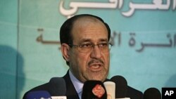 Iraqi Prime Minister Nouri al-Mailiki (Aug. 2011 file photo).